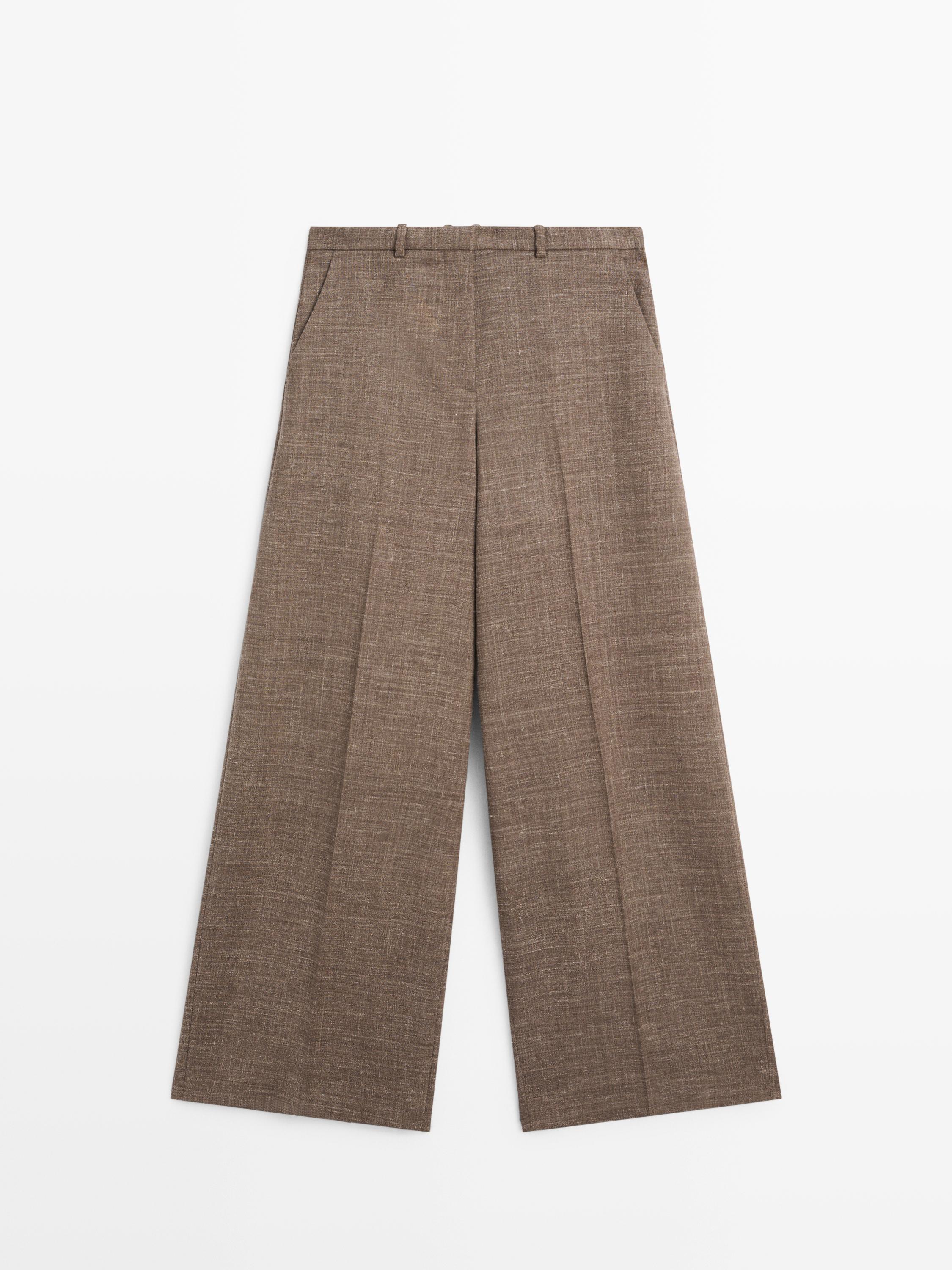 Wide-leg voluminous wool blend trousers